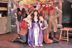 Elin Hampton stars as Snow White with the seven dwarves in the Nine O’Clock Players musical production of “Snow White,” directed by Todd Nielsen and now playing at the Assistance League Theatre in Hollywood.
